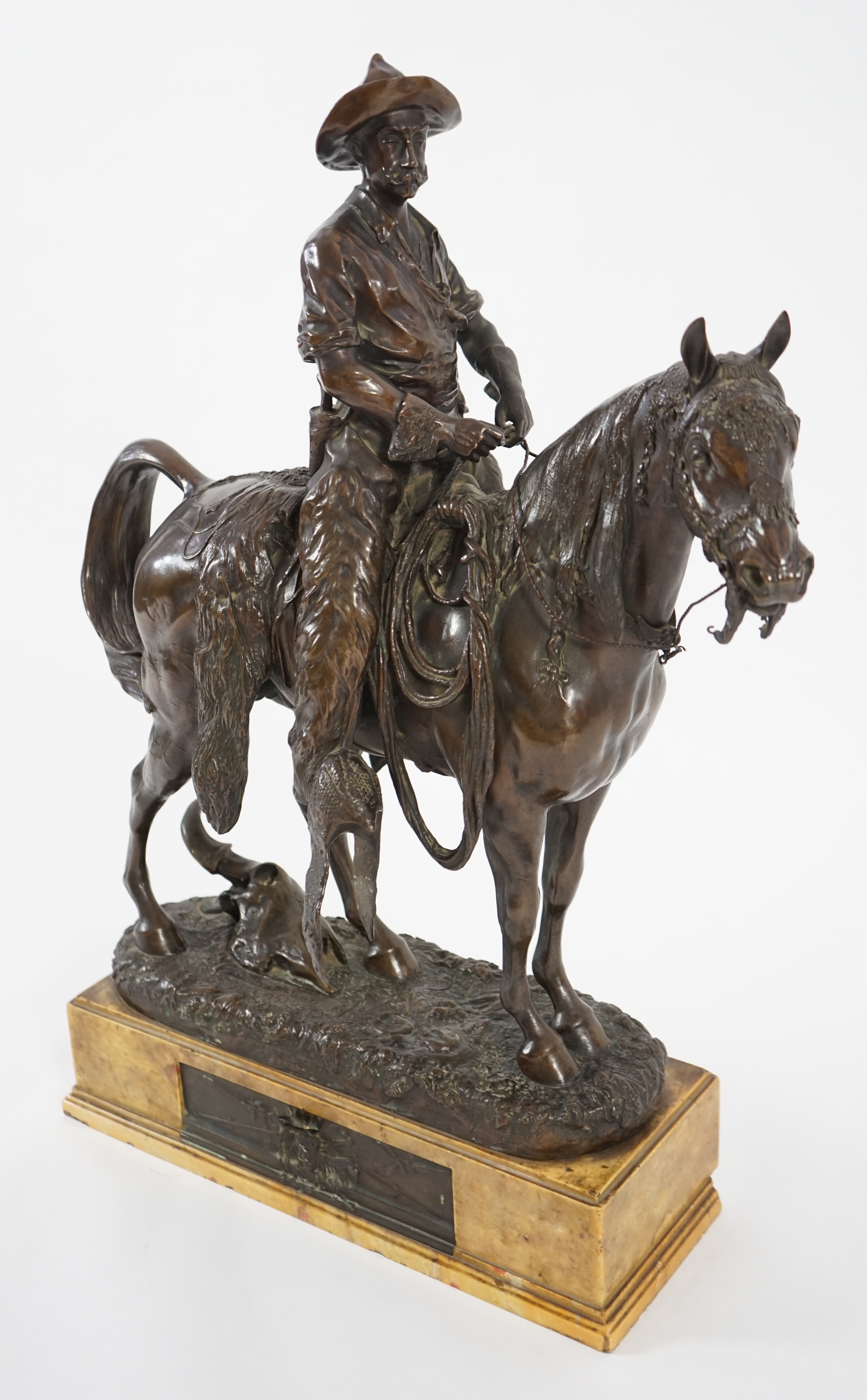 Walter Winans (St. Petersburg, 1852-Parsloe Park, Essex, 1920), a cast bronze of the artist, as a cowboy, riding the Arab stallion Skowronek, 50cm wide, 66cm high, overall 79.5cm high